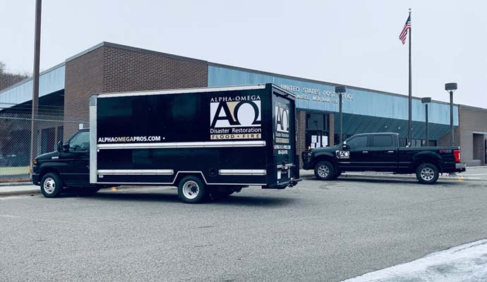 Alpha Omega disaster restoration trucks