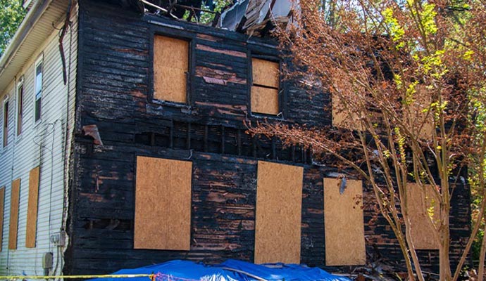 Board up service on a fire damaged house