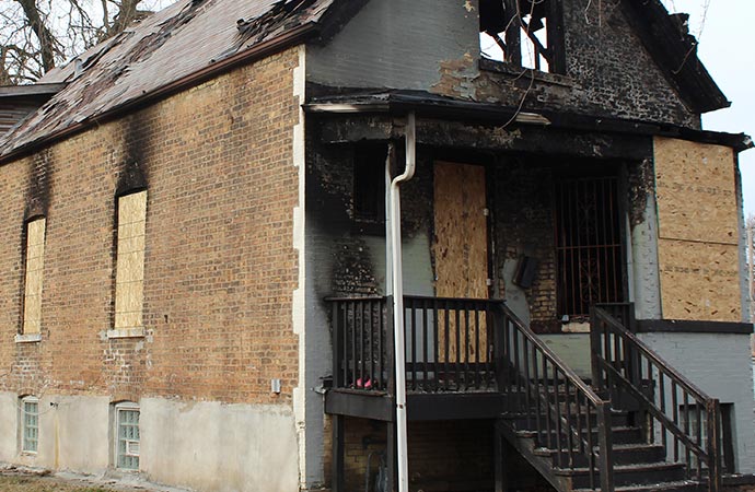 burn house black stairs board up service