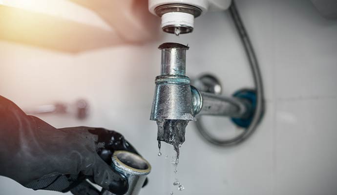 Clogged drain overflow repair