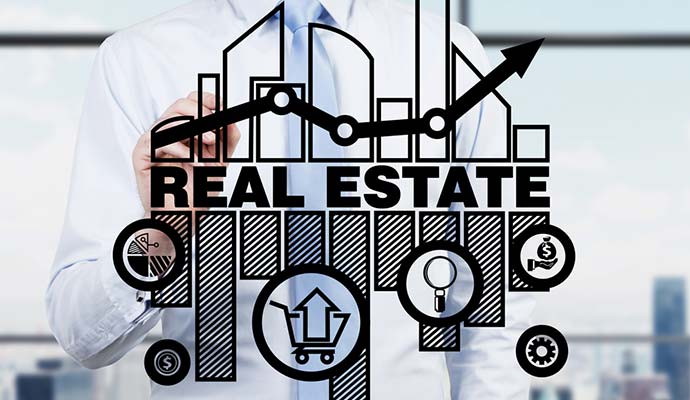 real estate agent drawing graph about real estate investing process