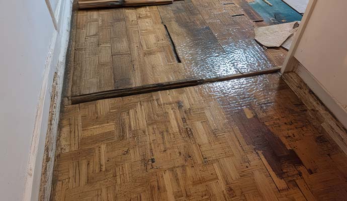 Damaged wooden floor caused by water