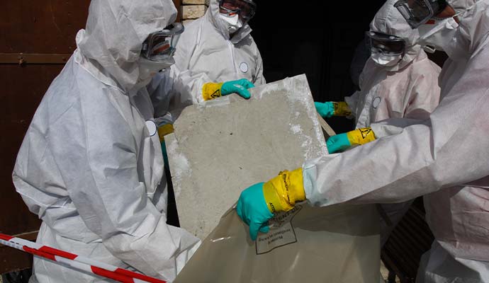 Experts removing asbestos