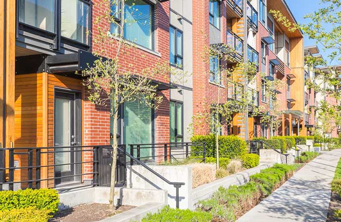 exterio of condo with landscaping