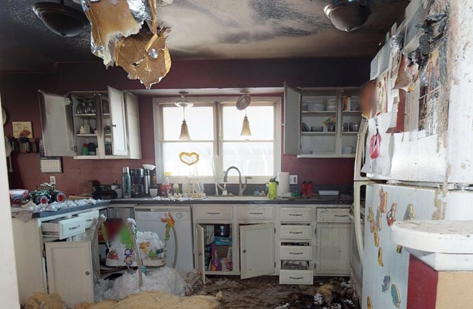 Fire damaged home, smoke soot and odor in the place