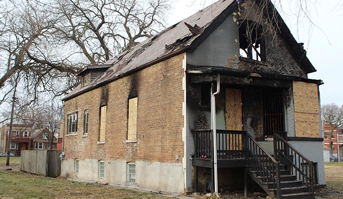 Fire damaged house board up service
