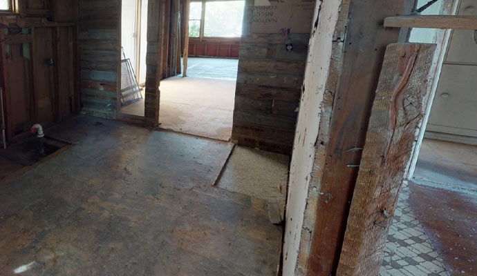 Gutted room with exposed studs