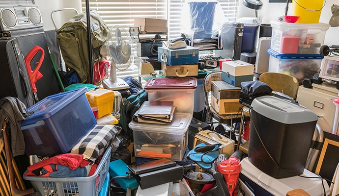 Hoarded room with excessive clutter and items