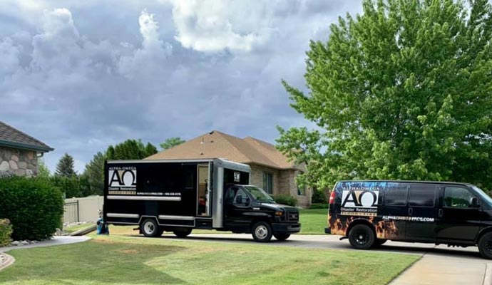 Alpha Omega Restoration Pros service vehicle