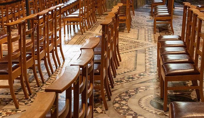 Restored wooden chairs in a church