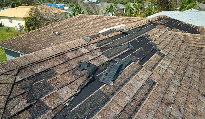 Storm damage on a residential shingle roof