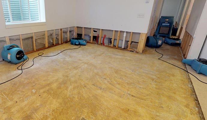 Water damage restoration service using equipment