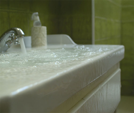 Water overflowing from bathroom sink